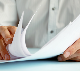 Man Holding Some Documents